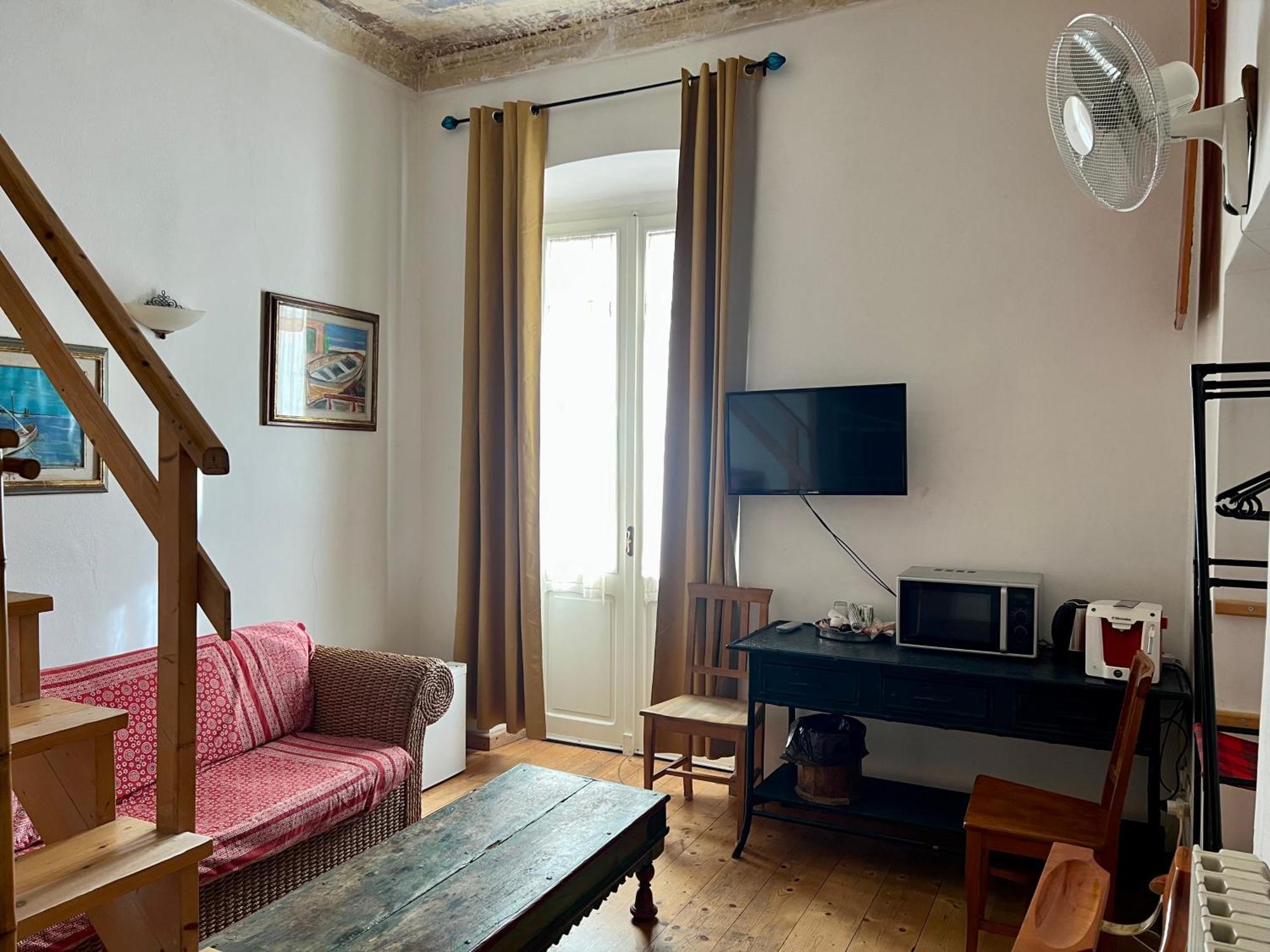 סאסארי B&B Le Finestre Su Via Cavour חדר תמונה